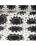 Tissu cretonne imprimé soleil étoiles 145 cm noir Tissu cretonne imprimé soleil étoiles 145 cm noir