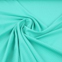 Tissu d'habillement polyester mini pois vert