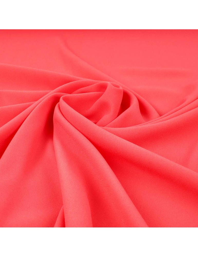Tissu crêpe uni corail