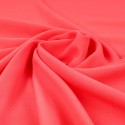 Tissu crêpe uni corail