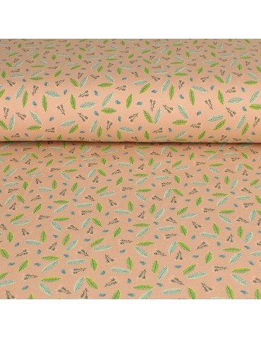 Tissu jersey coton imprimé feuilles vertes rose