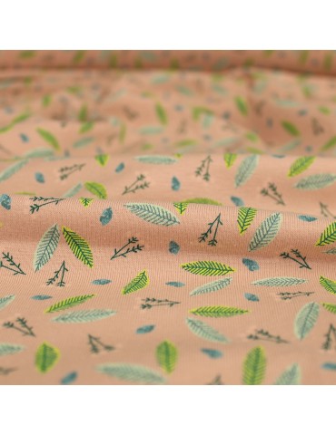 Tissu jersey coton imprimé feuilles vertes rose