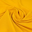 Tissu crêpe bouton d'or