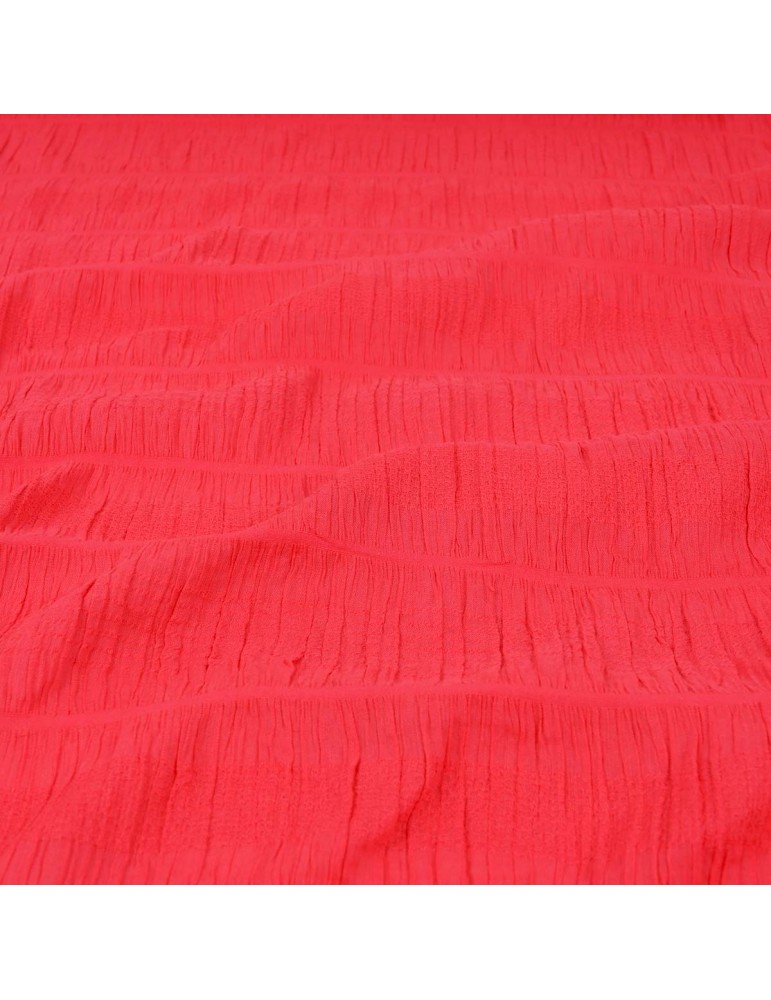Tissu gaufré brodé corail