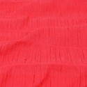 Tissu gaufré brodé corail